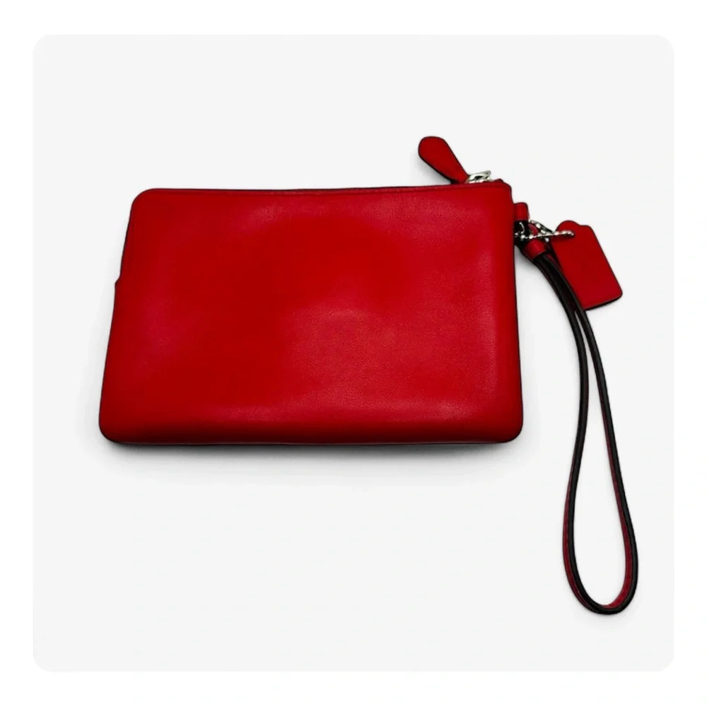 β
Coach RARE Western Rivets Wristlet - Red/Silver β
- Picture 4 of 16
